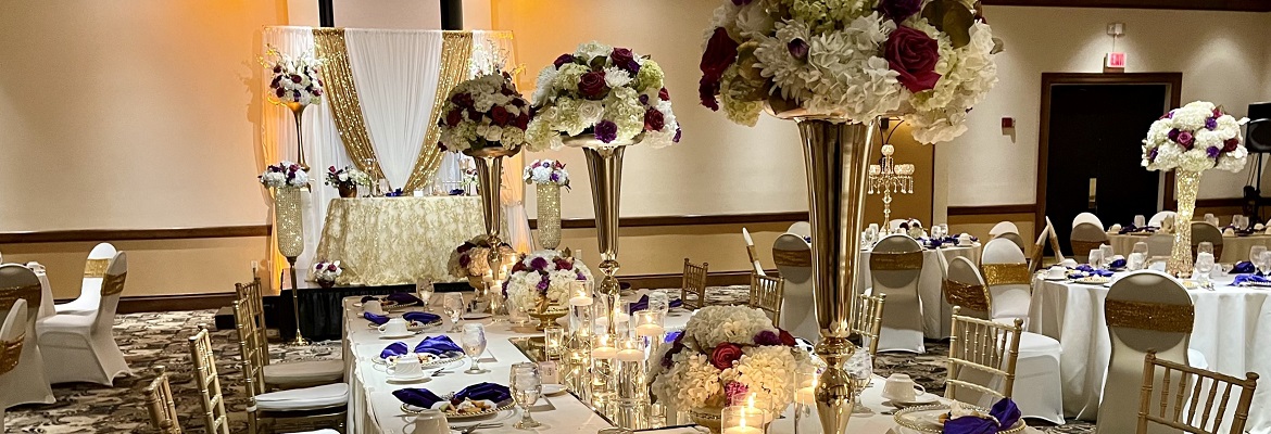 a table set with flowers and candles